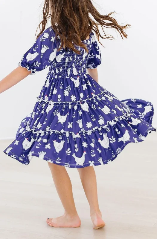 Feathered Friends Smocked Ruffle Dress